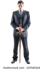 A Young Businessman isolated on a white background holding a steel sword