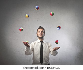 Young Businessman Juggling