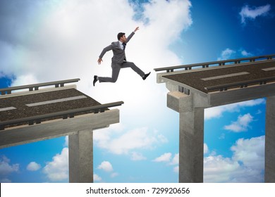 Young businessman jumping over the bridge - Powered by Shutterstock