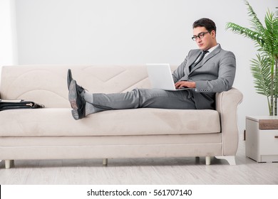 Young Businessman Lying On The Sofa