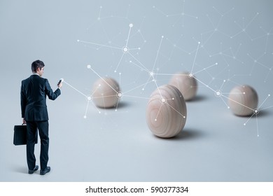 Young Businessman And Mesh Network Concept