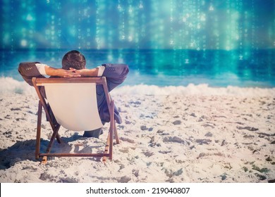 Young businessman relaxing on his sun lounger against lines of green blurred letters falling
