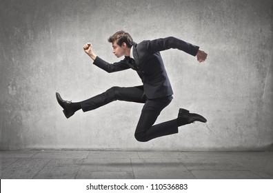 Young Businessman Running