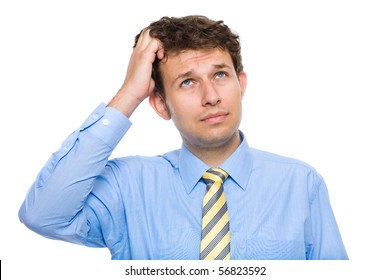 young businessman scratching his head, hard decision, studio shoot isolated on white background