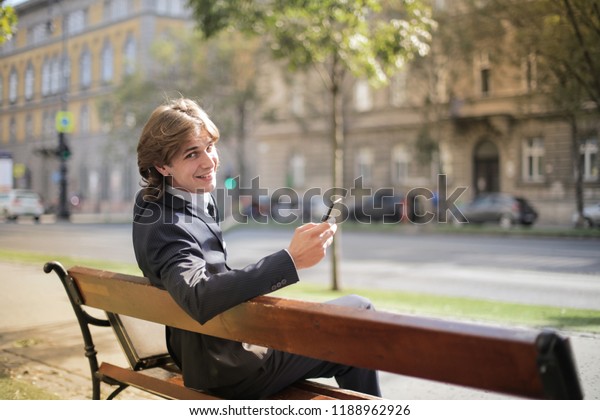 Young businessman with a\
smartphone