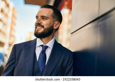 Young Businessman Smiling Happy Standing At The City.