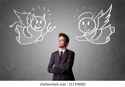 Young businessman standing between the angel and the devil drawings