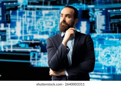 Young businessman studies artificial intelligence neural network on dashboards, using high tech automation tools for coding, analytics and machine learning for strategic development.