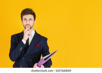 A Young Businessman In A Suit Is Holding A Document File And Reach Out A Hand To Hold The Hand On The Yellow Isolated Background. Business Image For The Banners.