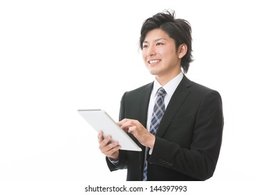 young businessman using tablet computer