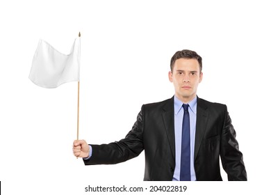 Young Businessman Waving A White Flag Isolated On White Background