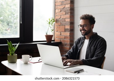 Young businessman working at home office. Man entrepreneur using laptop computer. Freelance work, work from home, student lifestyle, distance education, web conference, online learning, study, meeting - Powered by Shutterstock