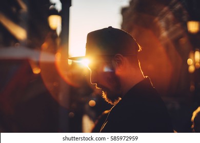 Young Businessman Working Standing Near Skyscraper Office At Sunset, Portrait Of Hipster Man In City Centre At Sunset, Sunset Light, Golden Light, Soft Focus