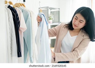 Young Businessowner Checking Clothes In Small Business.Businessman Checking Inventory In Stock Room. Store House Inspection.