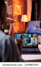 Young Businesspeople Having Discussion On Videoconference, Telecommunications And Remote Teamwork Concept. African American Female Team Lead Chatting With Coworkers Using Videocall Software And Laptop