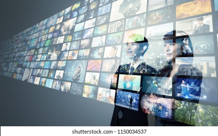 Young businesspeople looking virtual screen. - Shutterstock ID 1150034537
