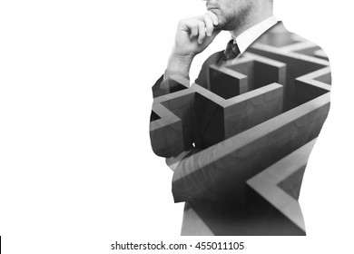 Young businessperson thinking about ways to overcome business obstacle. Isolated on white background with maze and copy space. Double exposure