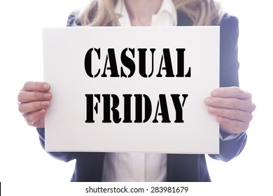 Young Businesswoman Behind White Board With Text Casual Friday   On White Background
