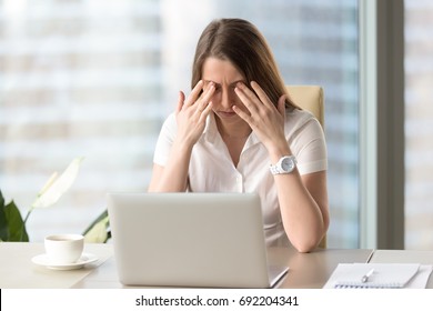 Young Businesswoman Doing Exercises At Workplace To Relieve Tired Of Computer Eyes, Massaging Closed Eyelids To Relax Muscles, Reduce Tension, Improve Vision, Yoga For Eye Strain, Eyesight Relaxation