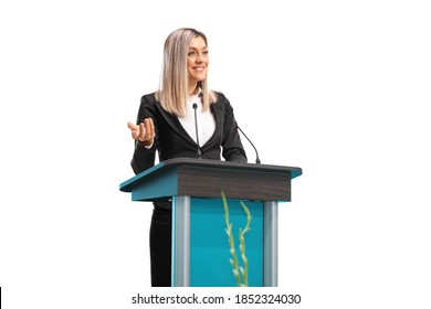 Young businesswoman giving a speech on a pedestal isolated on white background - Powered by Shutterstock