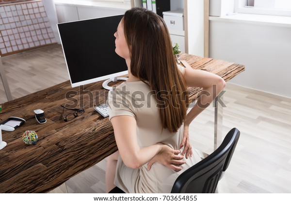 Young Businesswoman Having Back Pain Sitting Stock Photo Edit Now