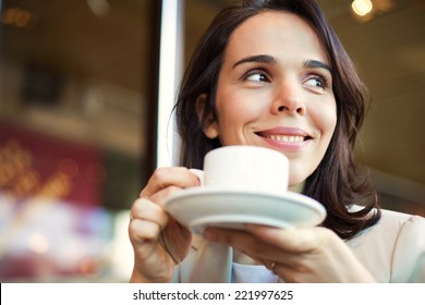 Young Businesswoman Having a Coffee Break.