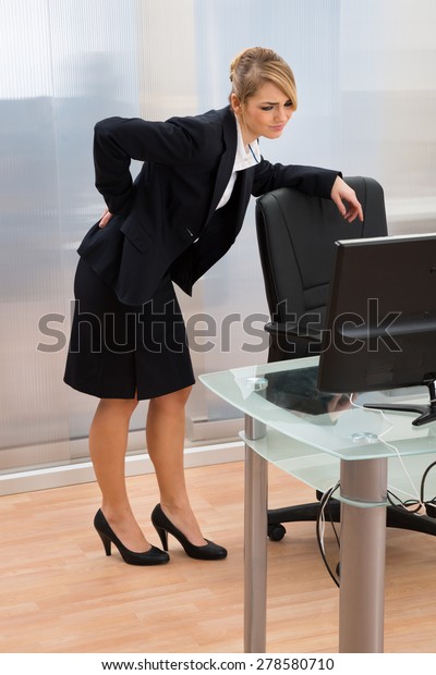 young-businesswoman-office-leaning-on-60