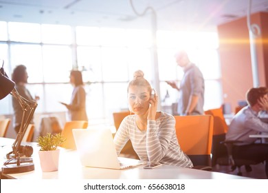 Young businesswoman programer in big bright office at work using computer - Shutterstock ID 656638018