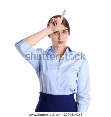 Young businesswoman showing loser gesture on white background