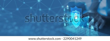 Young businesswoman is using laptop for cyber security protection.cyber security concept, user privacy security and encryption, secure internet access Future technology and cybernetics, screen padlock