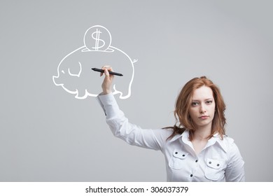 young businesswoman woman drawing a piggy Bank - Shutterstock ID 306037379