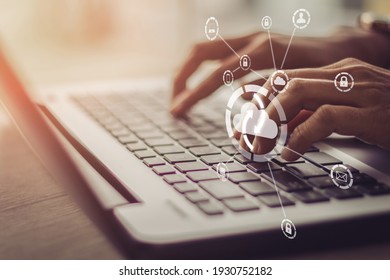 Young Businesswoman Working On His Laptop In The Office, Select The Icon Cloud On The Virtual Display.Concept Digital Technology And Cloud Technolog 