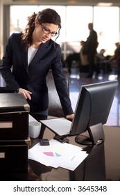 Young Businesswoman Works In The Lobby Of The Bank.