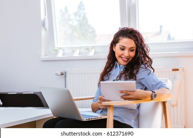 Young Bussines Woman Is Reading Her Notes