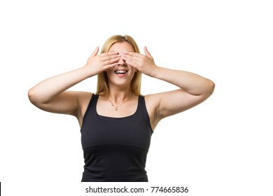 Young calmed european blonde woman  closing her eyes by hands isolated on white background