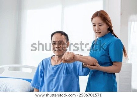 Young Caregiver Assisting Elderly Patient in Modern Healthcare Facility, Demonstrating Compassionate Care and Support in a Bright, Clean Environment