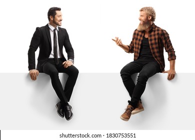 Young Casual Bearded Man And A Businessman Sitting On A Panel And Having A Conversation Isolated On White Background