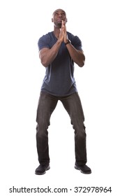 Young Casual Black Man Scared And Hoping On White Background