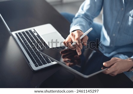 Similar – Image, Stock Photo Close up of man gamer hands using computer mouse is playing video game at night. Male hacker breaks into system, coding or data analysis programmer, developer or employee on tech for software code