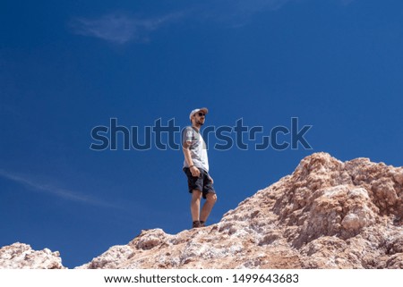 Similar – Image, Stock Photo black haired man posing with sunglasses