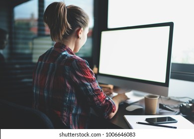 a young casual dressed modern student is looking for a job to practice after completing her studies at the university. a professional IT specialist uploading new content to the website. Blank screen
