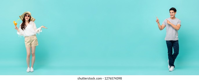 Young Casual Happy Asian Man And Woman On Light Blue Long Banner Background With Copy Space