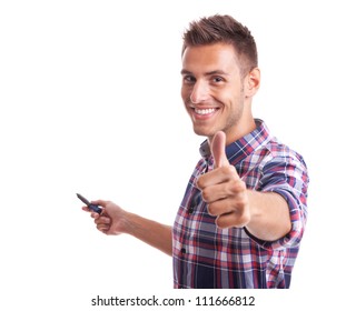 Young Casual Man Going Thumb Up And Holding A Marker On A White Background