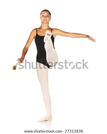 Young caucasian ballerina girl on white background and reflective white floor showing various ballet steps and positions. Grand Battement. Not Isolated.