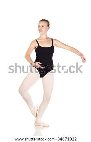 Young caucasian ballerina girl on white background and reflective white floor showing various ballet steps and positions. Not Isolated
