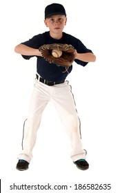 Young Caucasian Baseball Player Catching The Ball