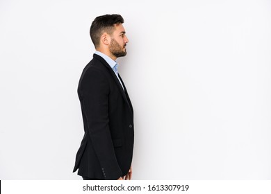 man standing sideways facing right