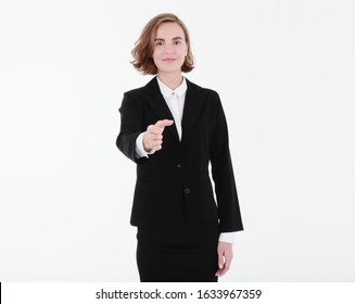 Young Caucasian Business Woman In Black Suit Reaching For Shake Hand To Greet Someone, Isolated On White Background.