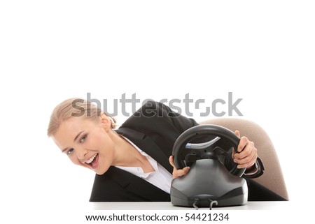 Young caucasian business woman playing on computer (with steering wheel), isolated on white background