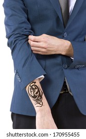 Young Caucasian Businessman Revealing A Hidden Tattoo